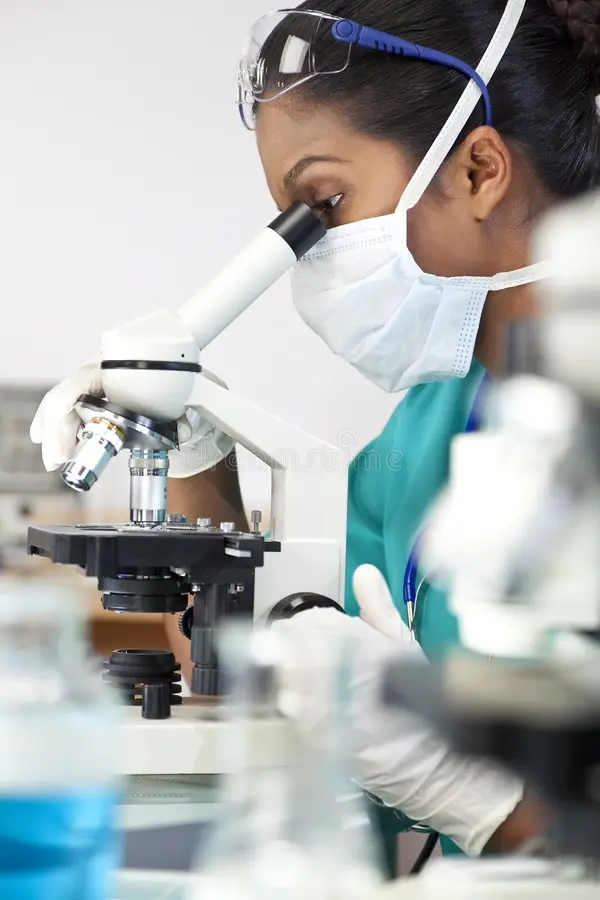 asian woman doctor microscope laboratory 10761612